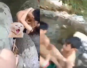 กลุ่มเพื่อนสนิทที่เล่นติดตลกบนฝั่งของลำธาร